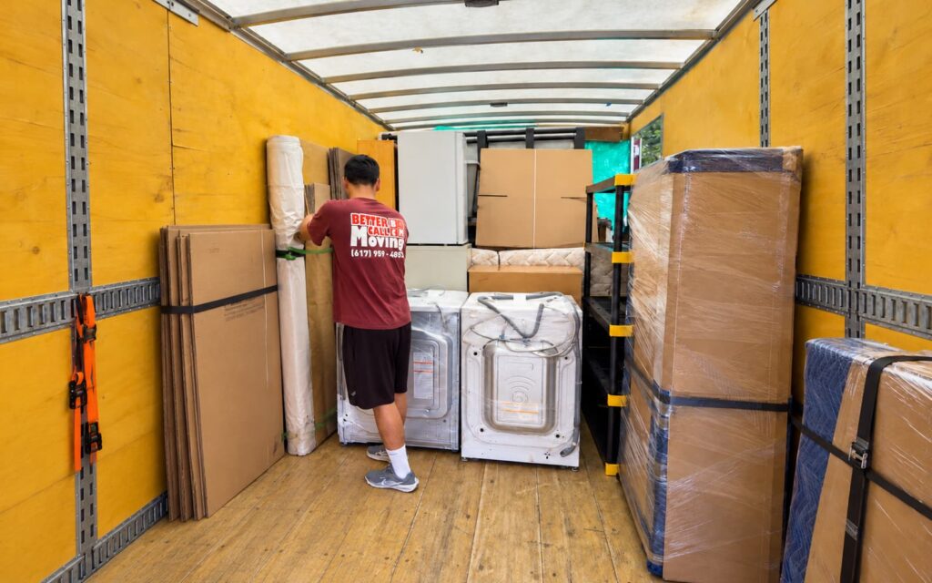 Washer and dryer wrapped for transport, ready to be reconnected and tested after the move