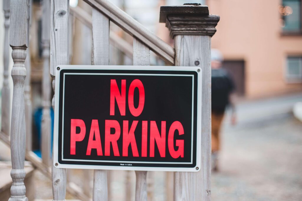 No parking sign on a residential street, a common challenge when planning truck parking for a move in Cambridge