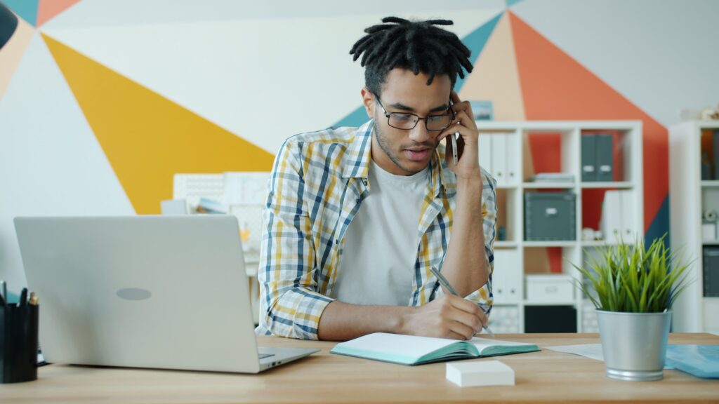 Planning a move over the phone with a moving company sales manager